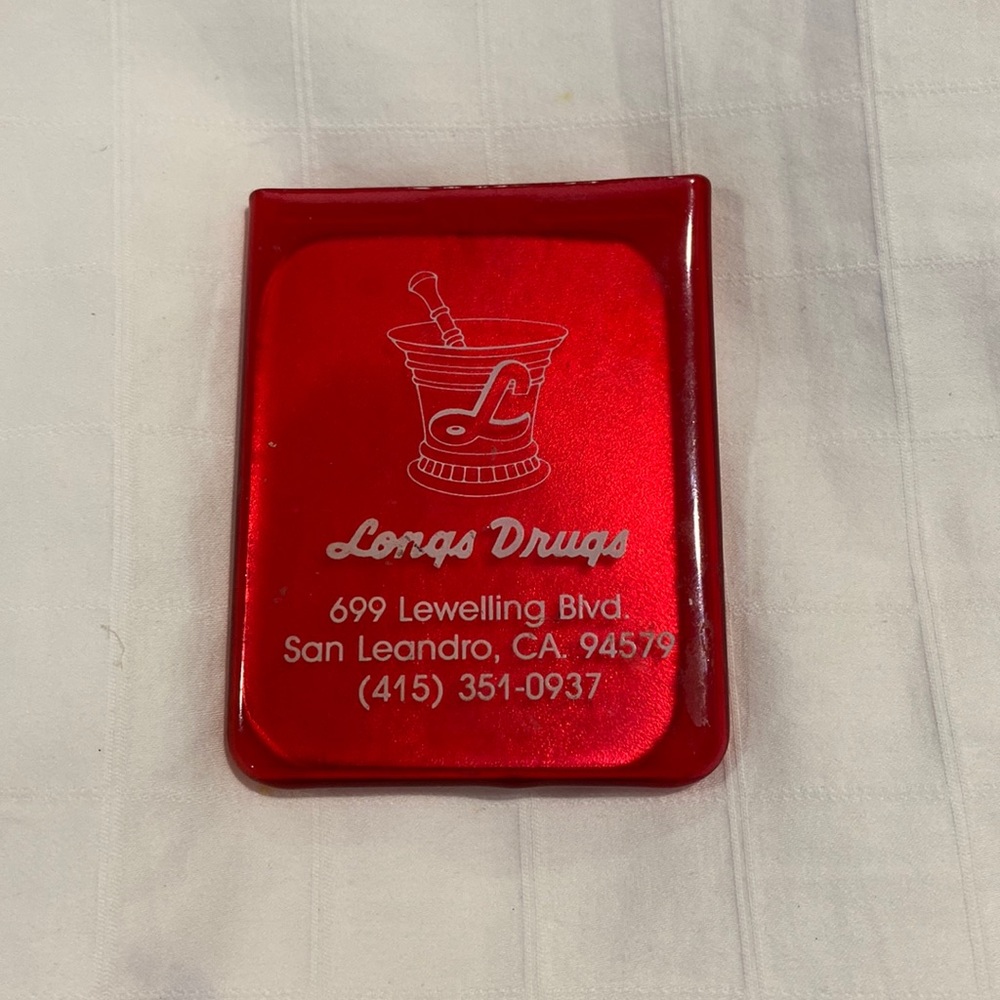 LONGS DRUGS VINTAGE GIVE AWAY MIRROR IN RUBBER CASE. COLLECTORS ITEM